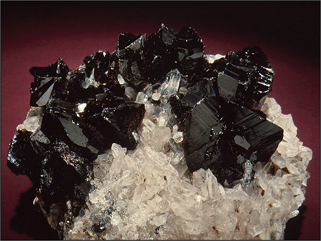 Black Cassitorite Crystals With White Quartz